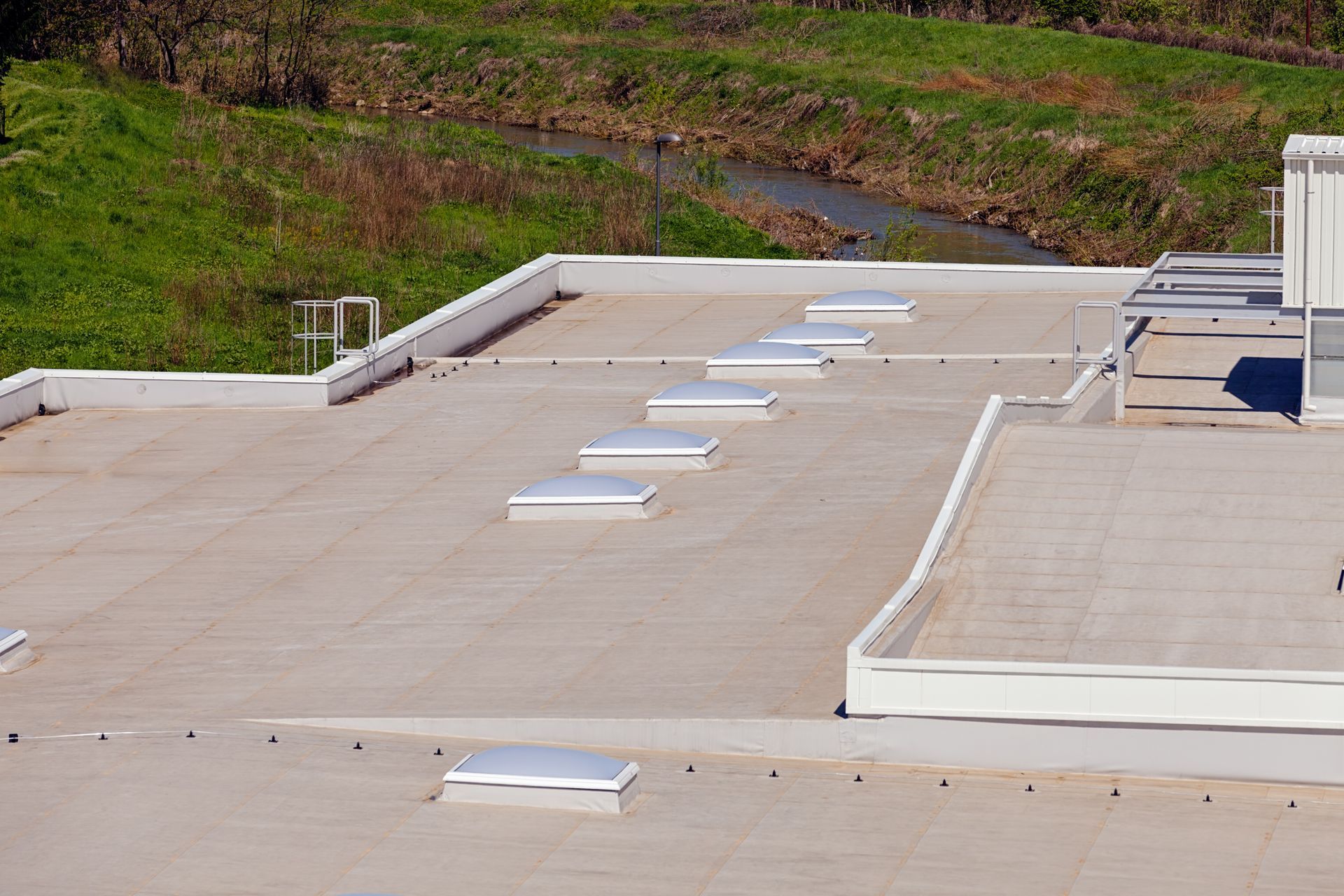 a roof with a lot of skylights on it